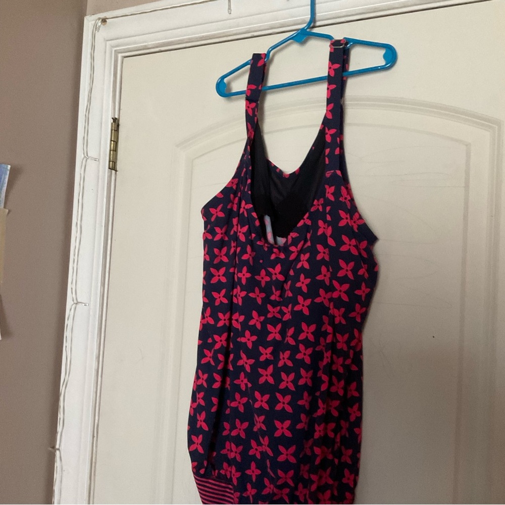 This is a navy blue and red bathing suit it with a built-in bra